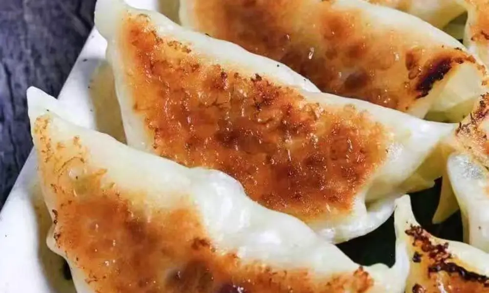 Pan-fried dumplings with savory filling at A J House, a Asian Restaurant in Clarkesville